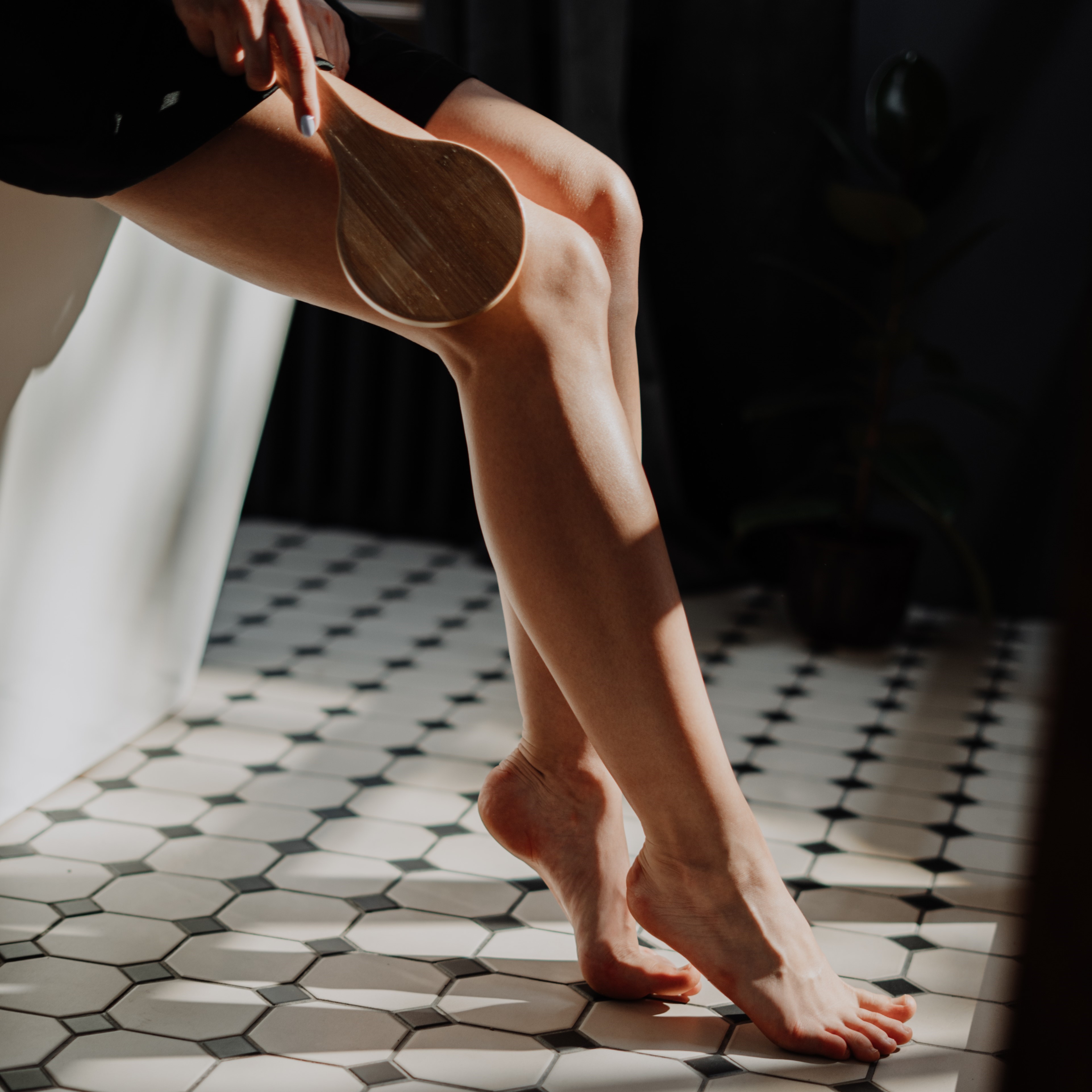 Dry brushing with a brush or loofah